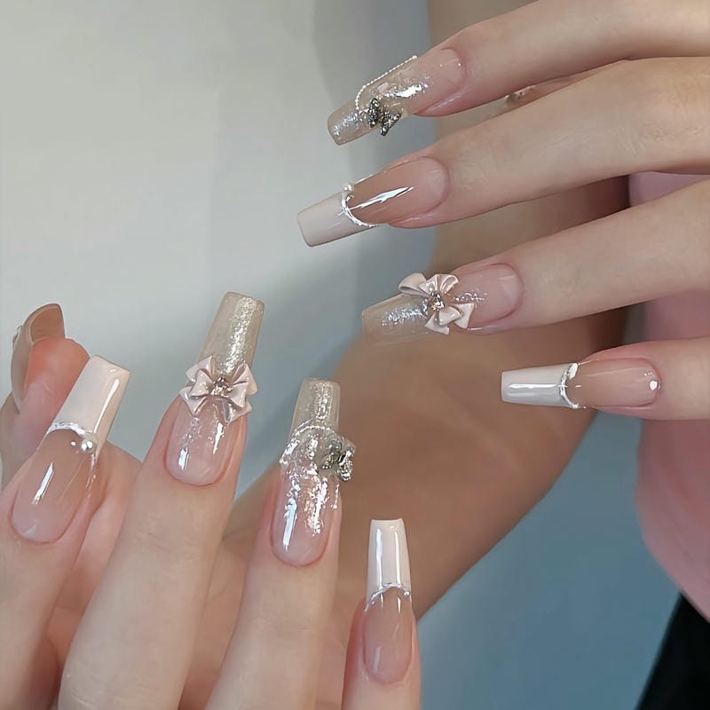 mẫu nail tết đính nơ xinh xắn